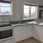 Seafront Haven In Island Bay With Deck, Outdoor Bath, And Parking