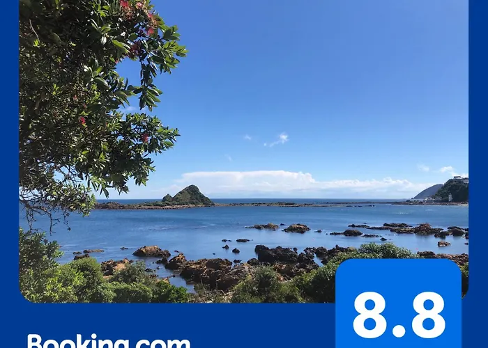 Seafront Haven In Island Bay With Deck, Outdoor Bath, And Parking