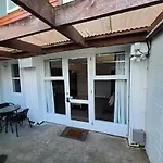 Abode For Two And A Few Paws